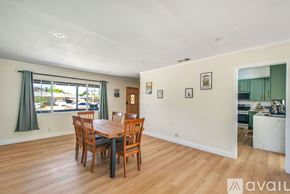 Garden Grove house for rent - A dining room with a table and chairs.