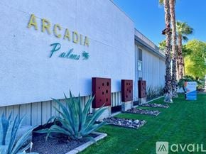 Phoenix apartment for rent - A white building with a sign that says Arcadia Palms.