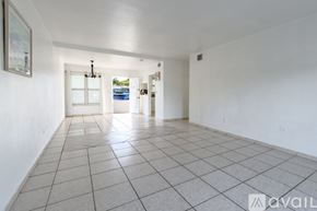 North Miami apartment for rent - A patio with a pool in the background.