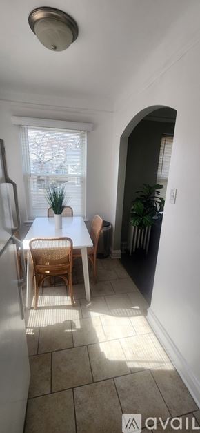 Oak Park apartment for rent - A bathroom with a white sink and a shower.