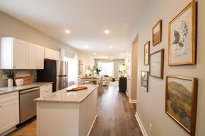 Little Rock house for rent - A kitchen with a white counter top and white cabinets.