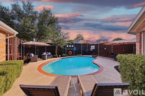 Frisco house for rent - A backyard with a pool and a basketball hoop.