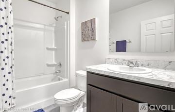 Rockledge house for rent - A kitchen with a white counter top and blue cabinets.