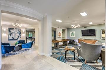San Diego apartment for rent - a living room with furniture and a television