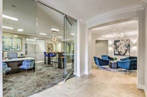 San Diego apartment for rent - a lobby with a conference room and a table with chairs