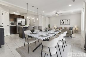 Parkville house for rent - A modern dining room with a large table and chairs.