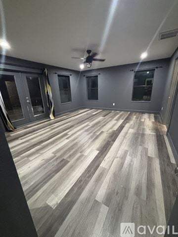 Spring Branch house for rent - A modern kitchen with a stainless steel oven and microwave.