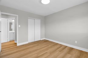 Waterloo apartment for rent - A room with a wooden floor and white walls.