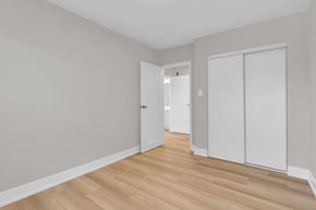 Waterloo apartment for rent - A room with a white door and a white wardrobe.