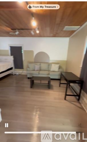 Greensboro apartment for rent - A living room with a couch and a coffee table.