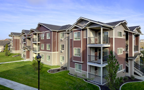 Colorado Springs apartment for rent - Pathway with grass to apt buildings Copper Creek Apartment Rentals | Colorado Springs, CO 80916