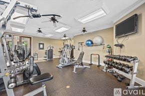 Knoxville condo for rent - A well-equipped gym with various exercise machines and weights.