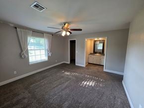 Harrah house for rent - A room with a ceiling fan and a window with curtains.
