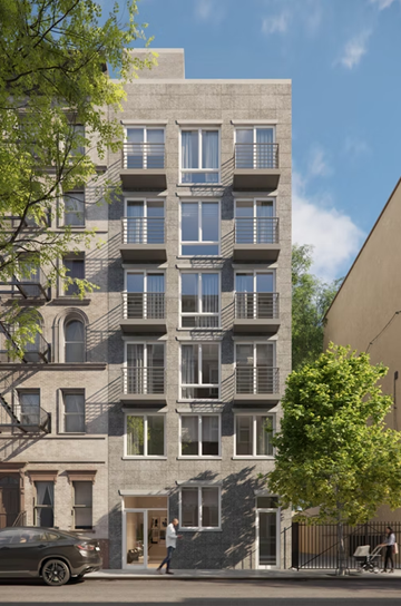 New York apartment for rent - A grey building with a tree in front of it.