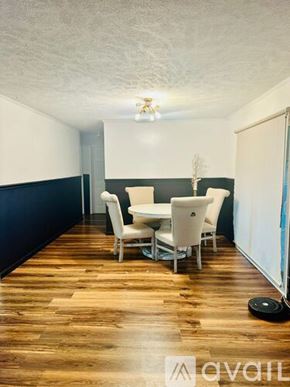 Henderson house for rent - A room with a dining table and chairs.