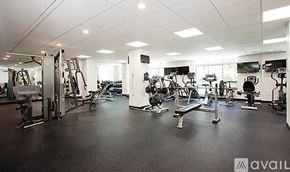 New York apartment for rent - A gym with a variety of equipment including treadmills, weights, and exercise machines.