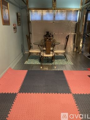 Lawrenceville house for rent - A dining room with a table and chairs.