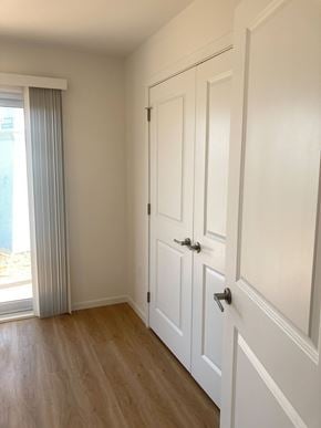Canso apartment for rent - A white door with a black handle is on the right side of the image.