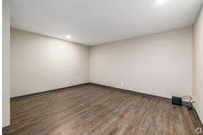 Springfield apartment for rent - A room with wooden flooring and a white ceiling.