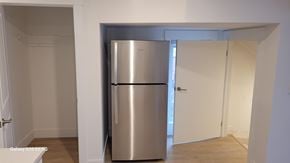 Bridgewater apartment for rent - A stainless steel refrigerator in a white room.