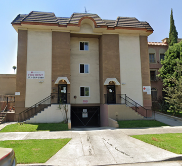 Los Angeles apartment for rent - A building with a sign that says "FOR RENT" is shown.