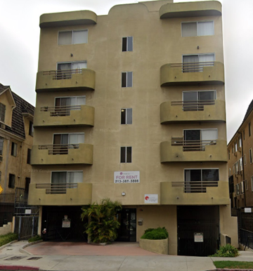Los Angeles apartment for rent - Apartment building with a sign that says "For Rent".