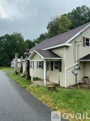 Claysburg apartment for rent - A house with a driveway in front of it.