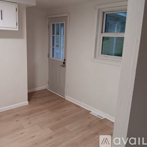 Claysburg apartment for rent - A room with a white door and a window with a white frame.