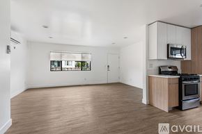 Los Angeles apartment for rent - A kitchen area with a stove and microwave.