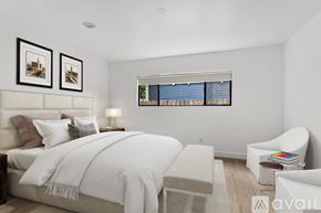 Los Angeles apartment for rent - A bedroom with a large bed and a chair.