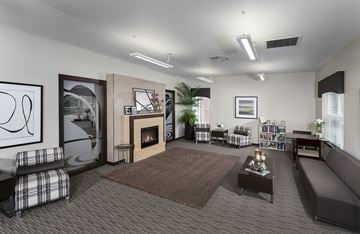 West Des Moines apartment for rent - a living room with a fireplace and a rug
