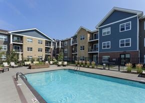 West Des Moines apartment for rent - pool with seating located in the middle of the apartment properties