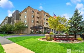 Appleton apartment for rent - A building with the number 400 on it and the words Richmond Terrace on a sign in front of it.
