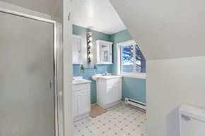 Kimberly house for rent - A bathroom with a white sink and a white toilet.