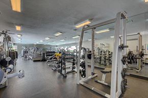 Las Vegas apartment for rent - a gym with a lot of weights and other exercise equipment