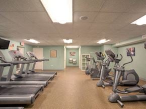 Weymouth apartment for rent - a gym with a bunch of exercise equipment in it