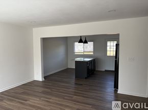Johnstown apartment for rent - A room with wooden floors and a cabinet in it.