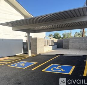 Phoenix apartment for rent - A parking lot with two handicap parking spaces.