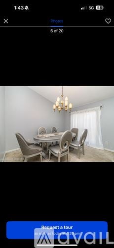 Palm Bay house for rent - A dining room with a table set for six.