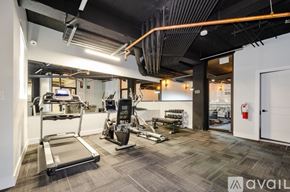 Chicago apartment for rent - A gym with treadmills, exercise bikes, and other equipment.