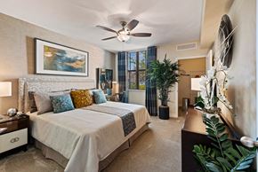 Miami Lakes apartment for rent - a bedroom with a bed and a ceiling fan
