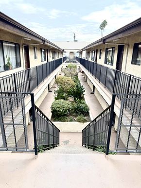 Glendale apartment for rent - A long row of houses with black railings.