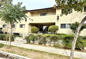 Glendale apartment for rent - A beige building with the number 515 on it.