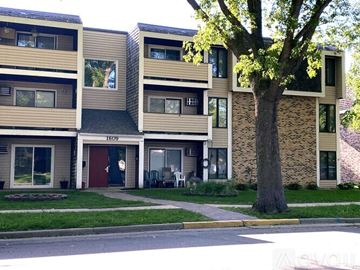 Willmar apartment for rent - Apartment building with a tree in front of it.