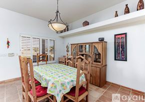 Lake Havasu City house for rent - A dining room with a table set for four.