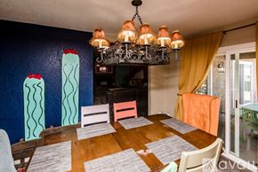Lake Havasu City house for rent - A dining room with a wooden table and chairs.