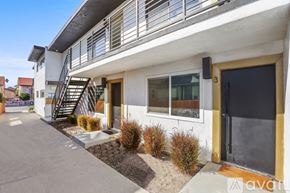 Los Angeles apartment for rent - A modern house with a white exterior and a black door.