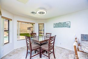 Lake Havasu City house for rent - A dining room with a table and chairs.