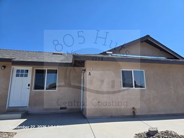 Santa Maria apartment for rent - A house with the number 805 on the roof and a white door.