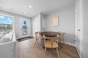 Ottawa apartment for rent - A dining room with a table and chairs.